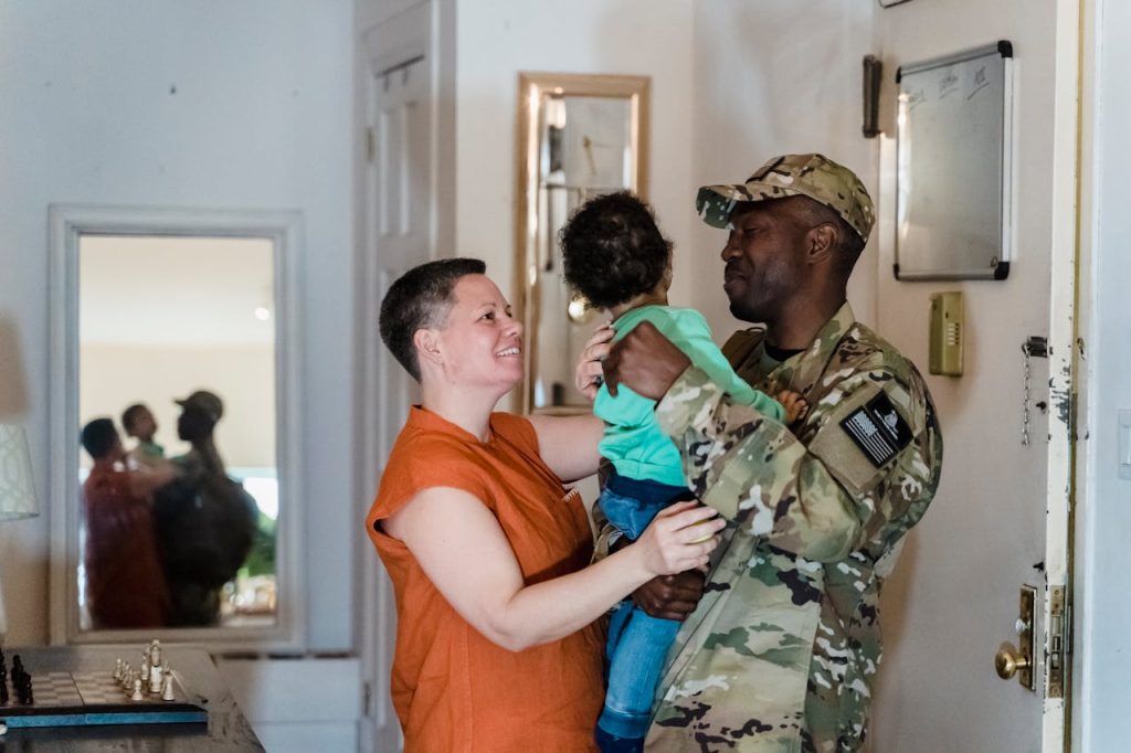 family waiting for military movers Boston