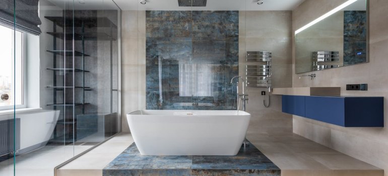 Modern bathroom interior with freestanding tub
