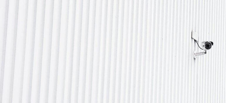 Cctv Camera On White Wall
