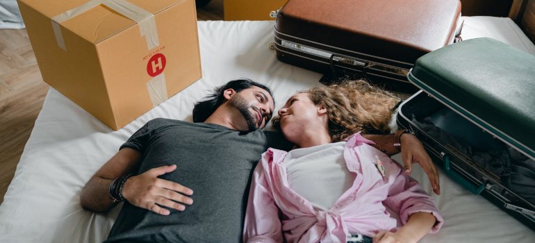 couple lying on a bed