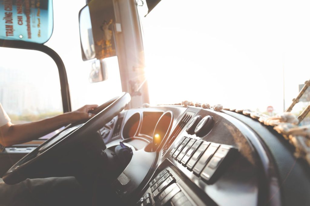 Person Hand On Steering Wheel
