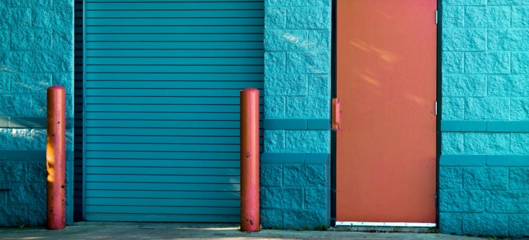 garage door next to a regular door